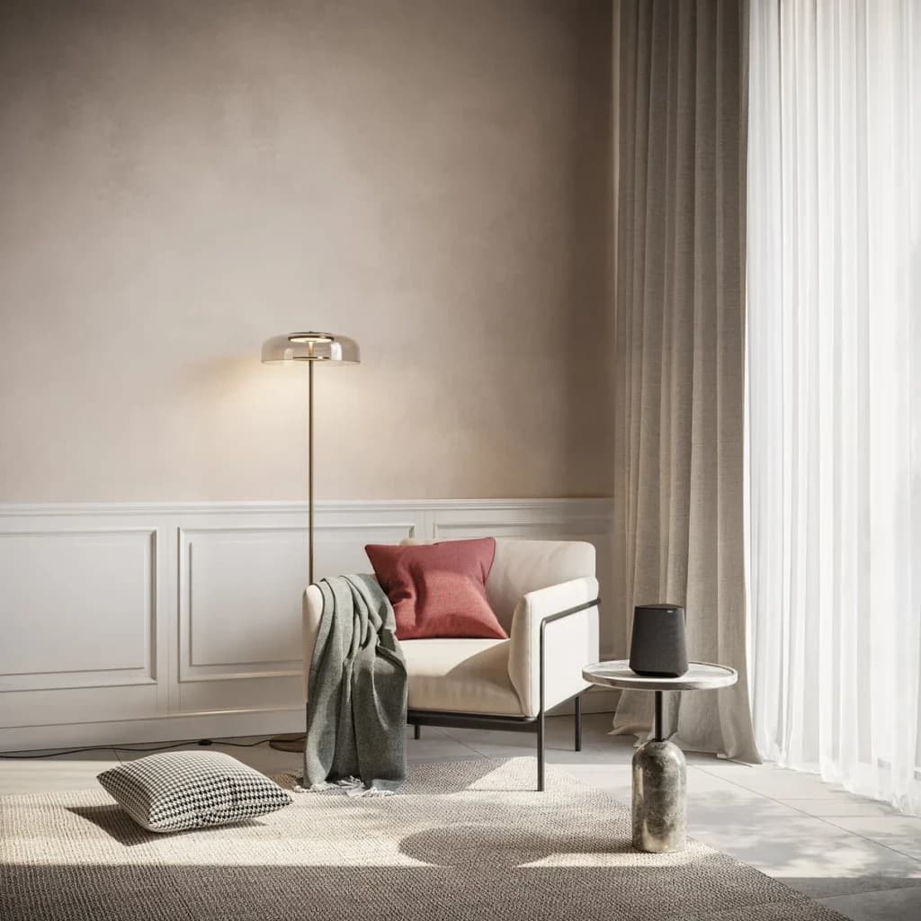 Altavoz Multiroom Loewe Klang MR1 30W WiFi Doble Banda, Bluetooth Gris, en uso: sobre mesa auxiliar en salón elegante junto