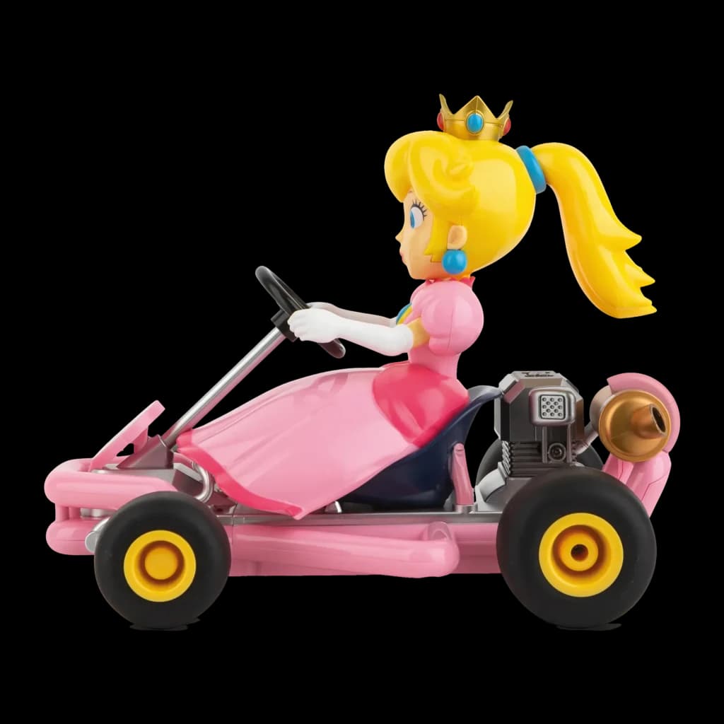 Coche RC Carrera Mario Kart Pipe Kart Princess Peach 1:18 Rosa 9km/h 30min, lateral: figura Peach con corona conduciendo
