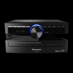 Chaîne hi-fi Panasonic SC-UX100E-K 300W Bluetooth, détail: bouton volume à anneau bleu, afficheur et lecteur CD