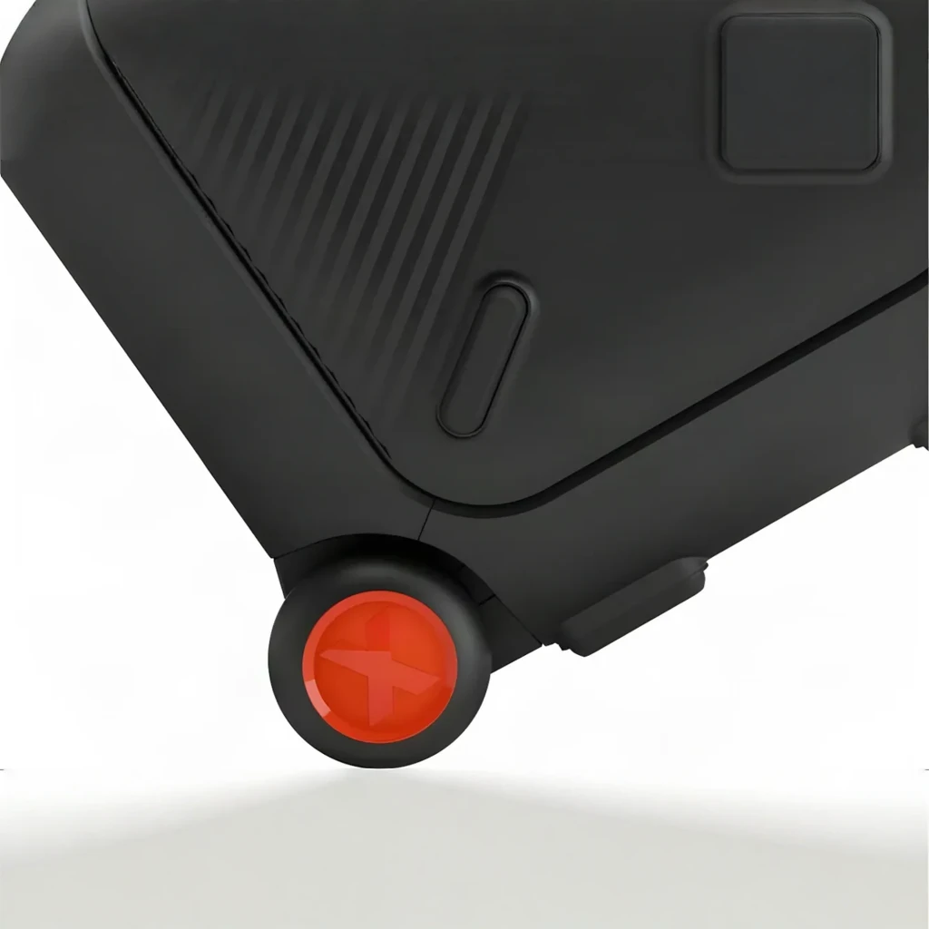 Enceinte de fête LG XBOOM XL9T IPX4 1000W Bluetooth 5.1, en usage: roue noire à moyeu rouge et coin inférieur du boîtier