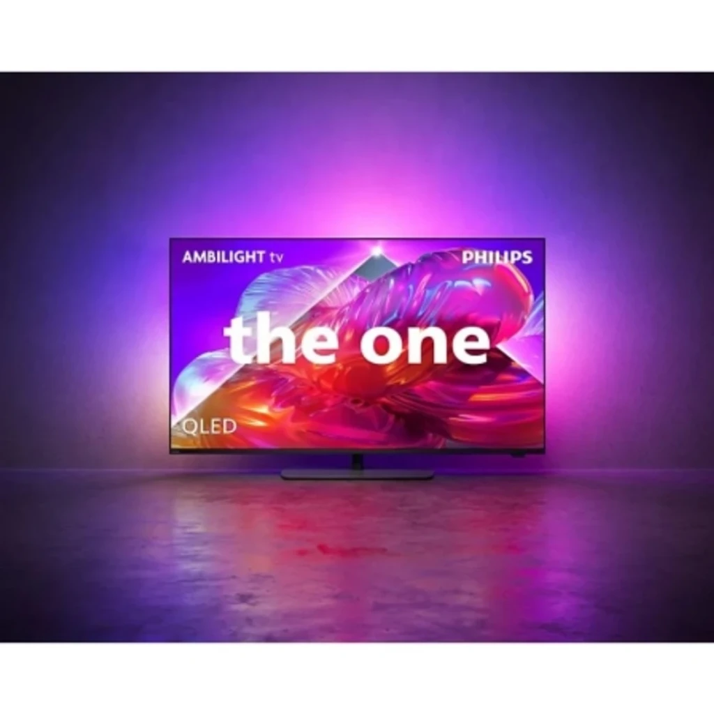 Philips 50PQS9011 50 pouces QLED 4K noir, vue de face: Ambilight actif avec halos violets et roses dans pièce sombre