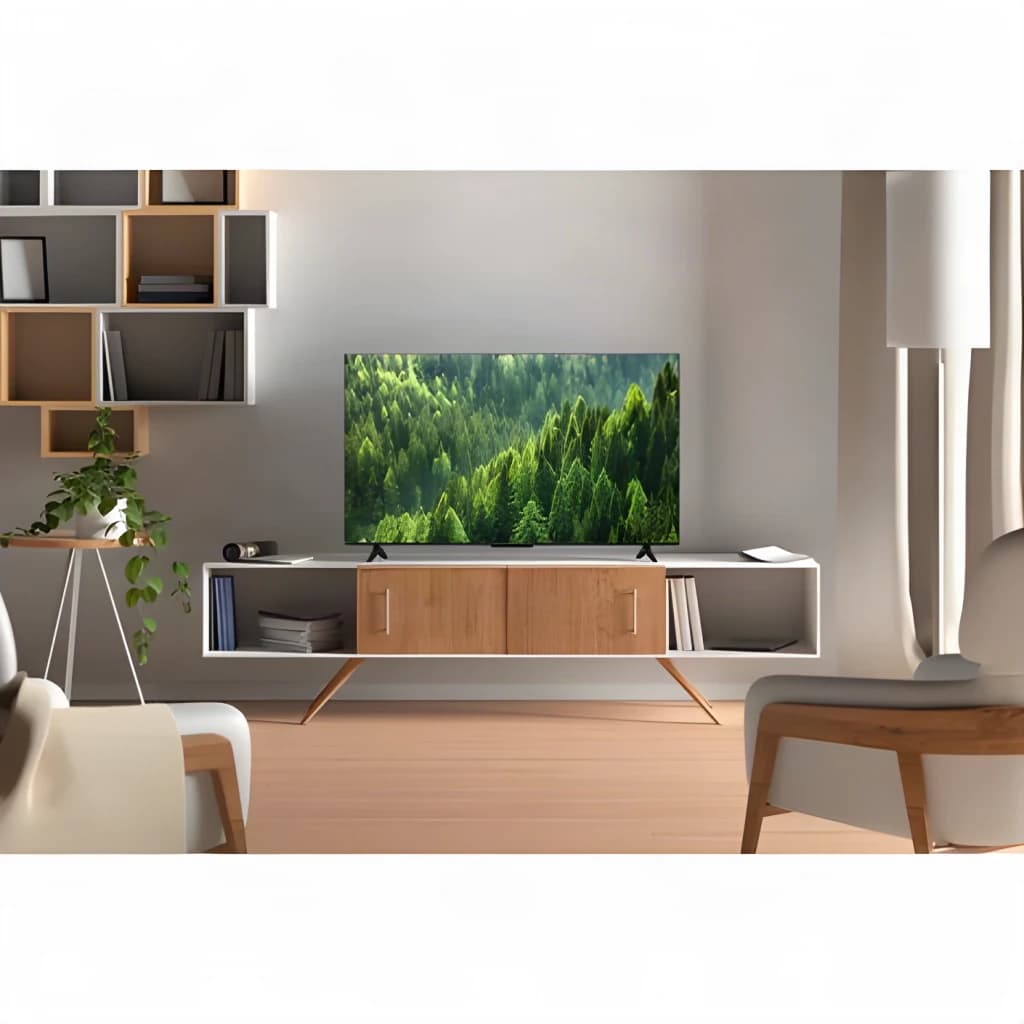 TV TCL 40 pulgadas QLED VA Full HD Negro 40S5L, vista frontal en salón: pantalla encendida con bosque sobre mueble nórdico