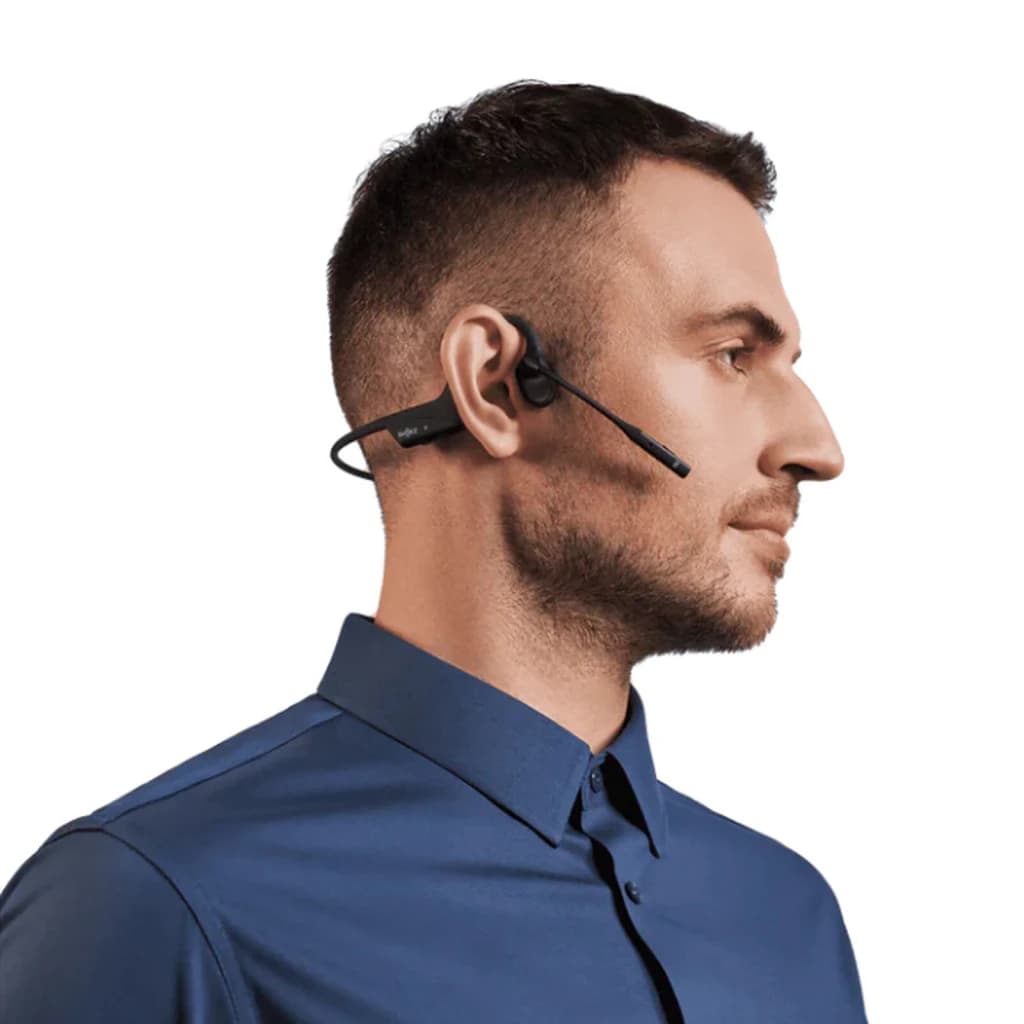 Auriculares de conducción ósea SHOKZ OpenComm2 Open-Ear Bluetooth 16h Negro, uso: hombre de perfil con micrófono boom