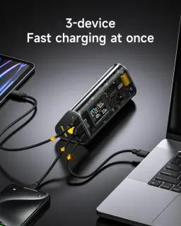 Power bank Sharge Shargeek 170 24000mAh 140W gris con carcasa transparente, pantalla de estado y tres puertos cargando laptop, tablet y smartphone
