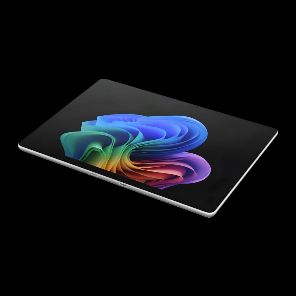 Tablet Microsoft Surface Pro platino, cuerpo delgado, pantalla OLED táctil de borde a borde con biseles finos, muestra fondo multicolor vibrante