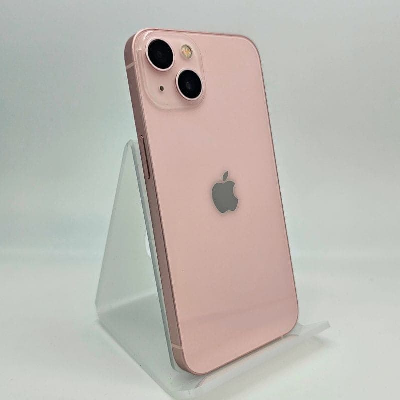 iPhone 13 256GB Rosa Renovado Estado Excelente; carcasa rosa pastel, doble cámara trasera diagonal, logo Apple, bordes planos, sin rayones visibles