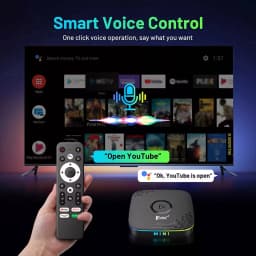 TV box preta compacta com controle remoto, Android 14, suporte 8K, luz LED frontal, ícones de apps na tela e comando de voz destacado