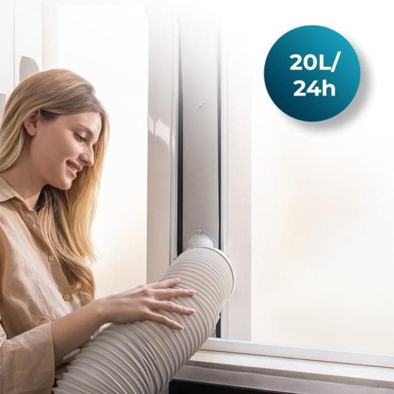 Cecotec ForceClima 7100 Soundless con manguera flexible instalada en ventana corredera, diseño blanco compacto y silencioso, capacidad de deshumidificación
