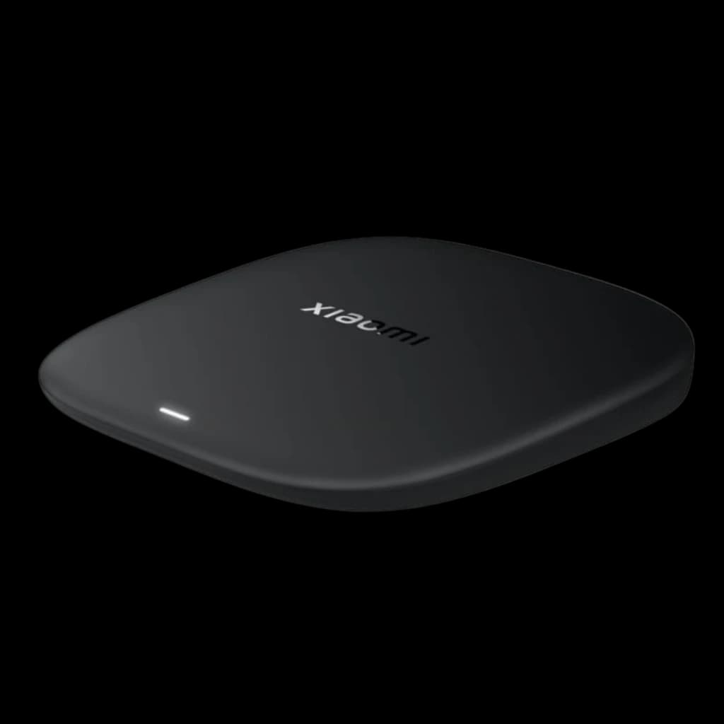 Xiaomi TV Box S 3rd Gen 4K negro mate, diseño compacto y curvo con luz LED frontal; carcasa minimalista y logo Xiaomi en la tapa superior