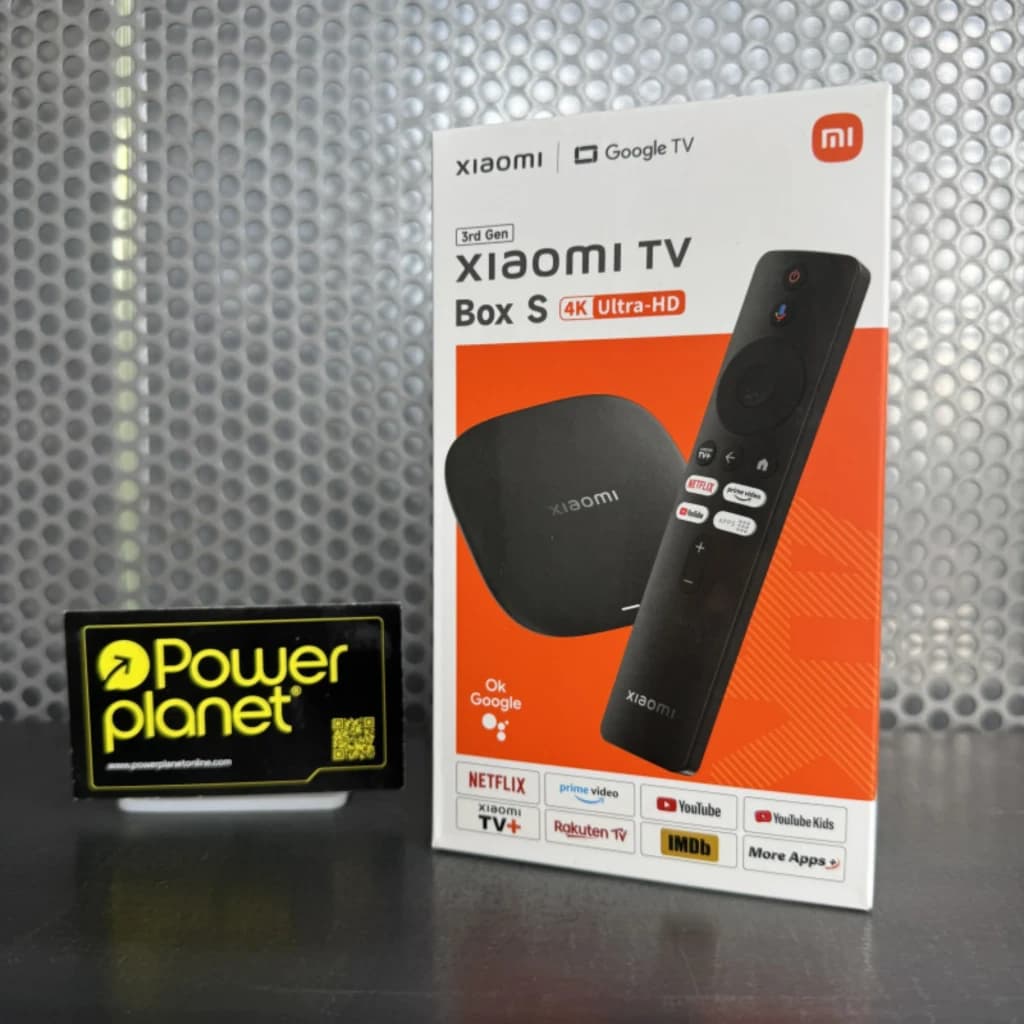 Xiaomi TV Box S 3rd Gen 4K 32GB con mando a distancia negro, botones dedicados a apps, diseño compacto cuadrado y logo Xiaomi en caja y dispositivo