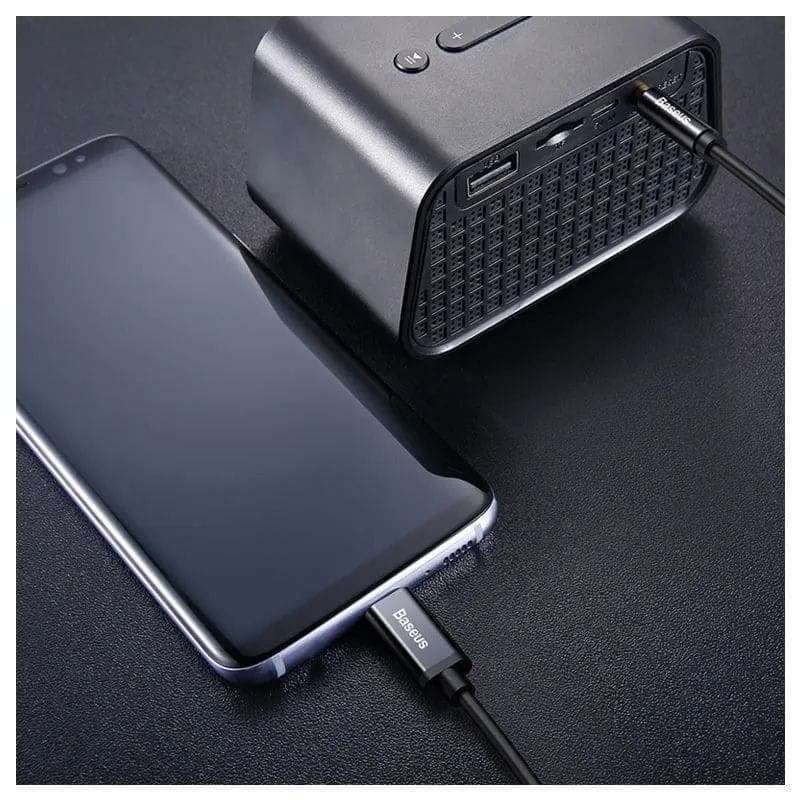 Baseus Yiven - Câble audio USB Type C vers mini-jack 3,5 mm image connectant un haut-parleur et un téléphone portable