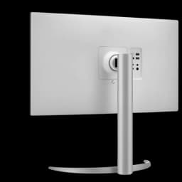 Parte trasera del LG 27UP850K-W: acabado blanco, soporte metálico curvo, gestión de cables integrada y puertos USB y HDMI accesibles en el panel trasero