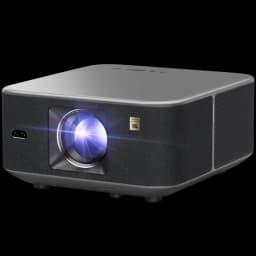 Proyector Yaber K3 Pro 1080P con lente frontal iluminada, cuerpo gris compacto, rejillas laterales y logo JBL en el panel, diseño moderno y robusto