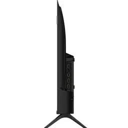 Parte trasera del TCL 32S4K 32" HD QLED: panel negro con soporte de dos patas, rejillas de ventilación, puertos centrales y diseño geométrico en la cubierta