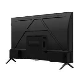 Parte trasera de TCL 32S4K 32" HD QLED: panel negro con tapa texturizada, puertos laterales, soporte central para pared y patas metálicas inclinadas.