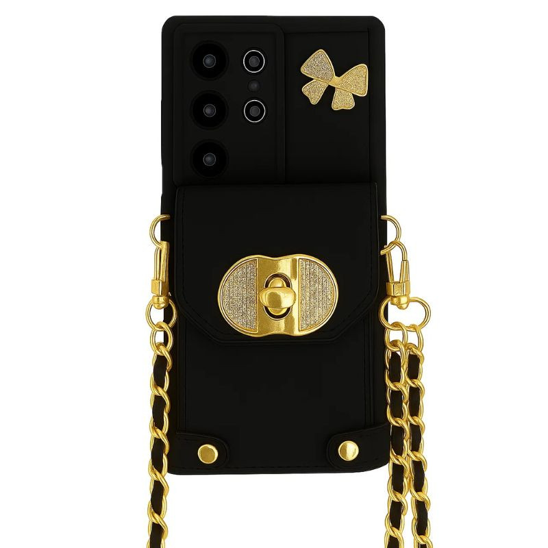 Funda Cartera Cadenas Colgantes Coquette Samsung Galaxy A56 Negro: capa preta com bolso tipo carteira, corrente dourada dupla, fecho e laço dourados - Item