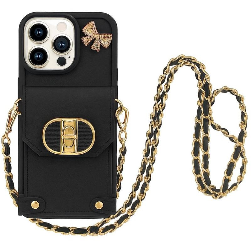 Funda Cartera Cadenas Colgantes Coquette iPhone 16 Pro Max, Negro con cadena dorada entrelazada, bolsillo frontal con hebilla, charm de lazo y bordes reforzados - Ítem
