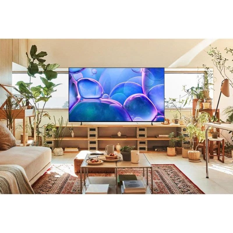 Samsung TU85U7025FK 85" 4K Ultra HD LED Smart TV Negro, imagen real sobre un mueble de salón