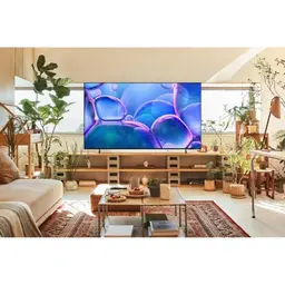 Samsung TU85U7025FK 85" 4K Ultra HD LED Smart TV Negro, imagen real sobre un mueble de salón