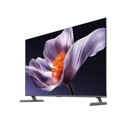 Xiaomi TV S Pro 2026 65 4K UHD MiniLED com tela fina sem bordas visíveis, suporte duplo metálico e imagem vívida com flor roxa em alto contraste