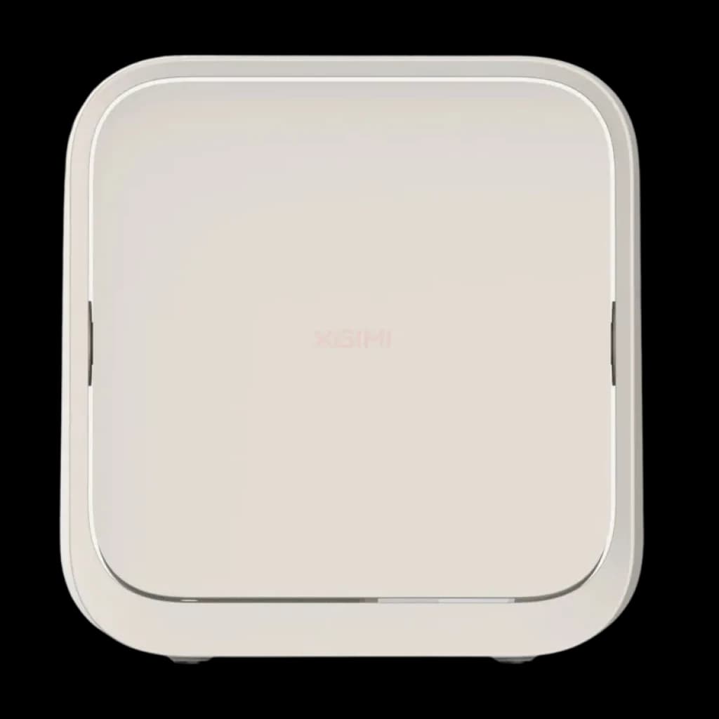 Projecteur portable blanc compact à bords arrondis, façade lisse avec logo Xgimi discret, design minimaliste élégant et support intégré pour une