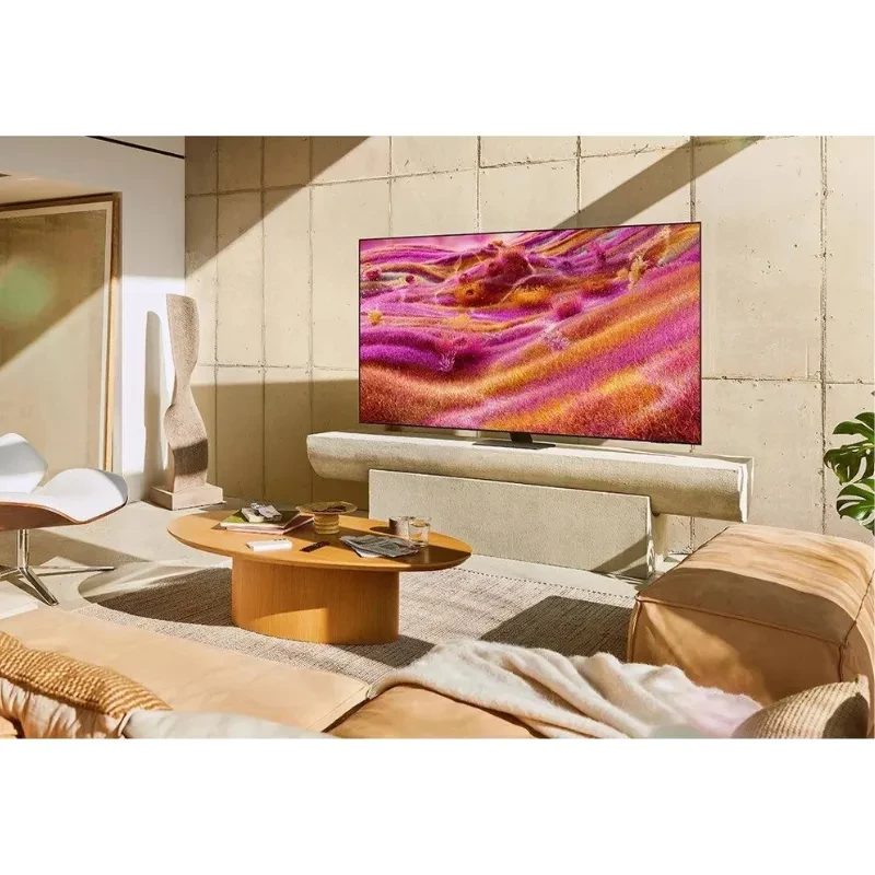 Samsung TQ85QN90FAT 85 4K Neo QLED com tela fina, bordas quase invisíveis, base central discreta e cores vibrantes com destaque em rosa e dourado - Item1