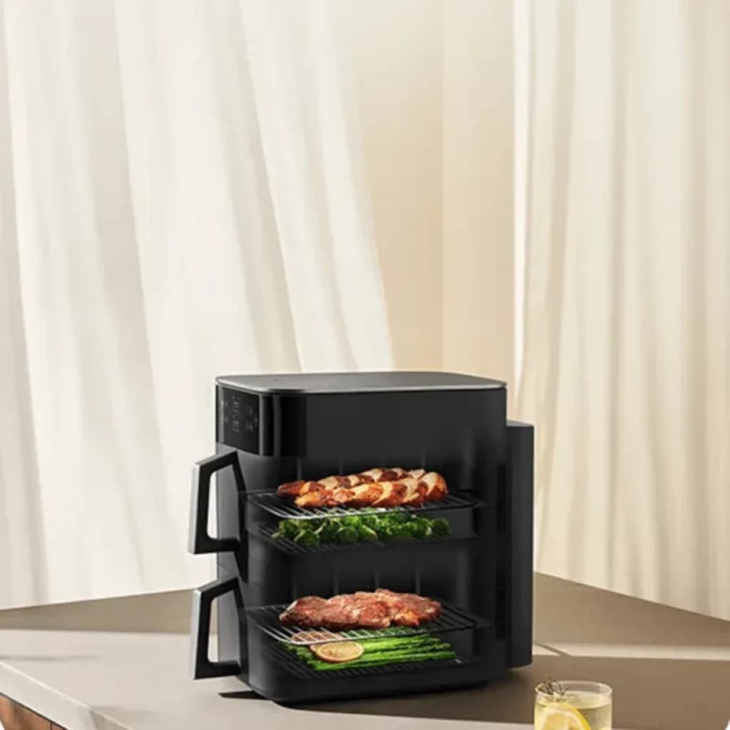 Xiaomi Smart Double Stack Air Fryer 12L noir, design compact, deux étagères visibles pour cuire simultanément poulet, légumes et viande, écran tactile
