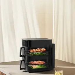 Xiaomi Smart Double Stack Air Fryer 12L noir, design compact, deux étagères visibles pour cuire simultanément poulet, légumes et viande, écran tactile