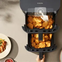 Xiaomi Smart Double Stack Air Fryer 12L avec deux tiroirs superposés, grande capacité, surface noire mate et poignées centrales pour cuisson simultanée