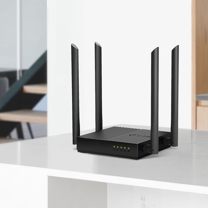 TP-Link Archer C64 Ethernet Wi‑Fi Dual negro con 4 antenas altas, LED frontales y diseño compacto en carcasa mate, ideal para señal estable en hogar u