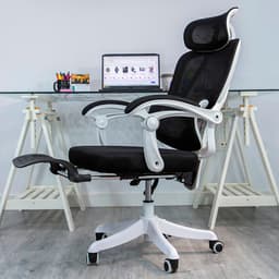 vista frontal y lateral de la Silla de Oficina Powerbasics Confort T20 Negro con reposapiés