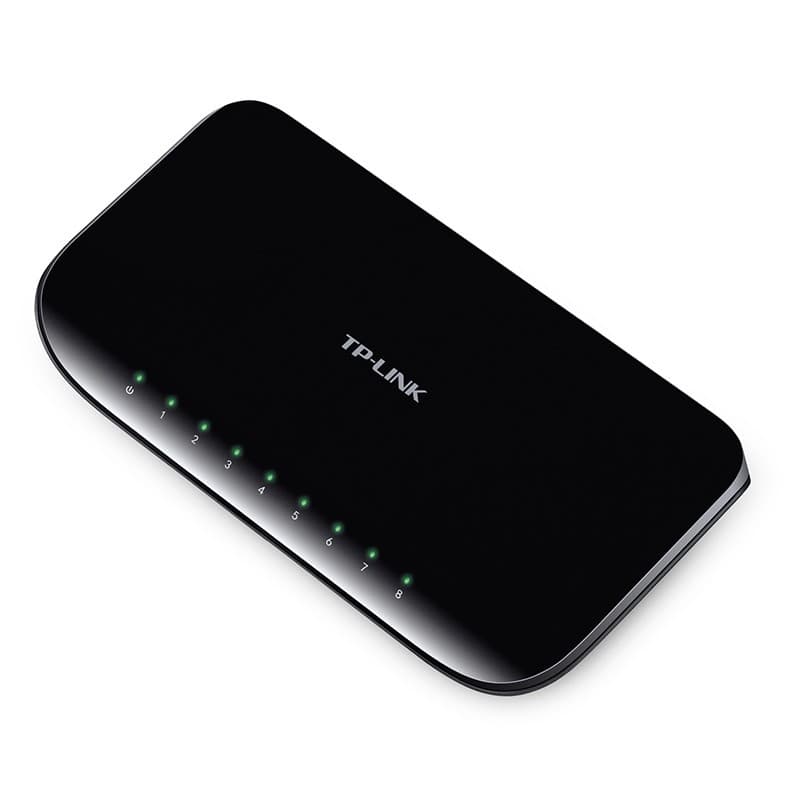 Switch TP-LINK noir compact, 8 ports Gigabit alignés avec voyants LED verts, boîtier brillant arrondi, format bureau élégant et discret
