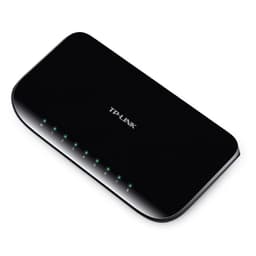 Switch TP-LINK noir compact, 8 ports Gigabit alignés avec voyants LED verts, boîtier brillant arrondi, format bureau élégant et discret